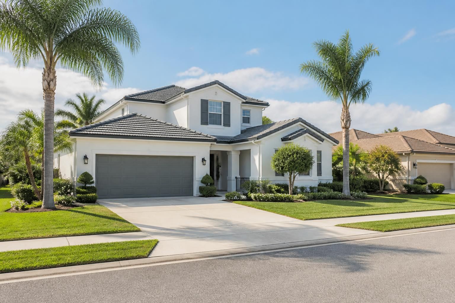 Sunny suburban neighborhood with homes and palm trees